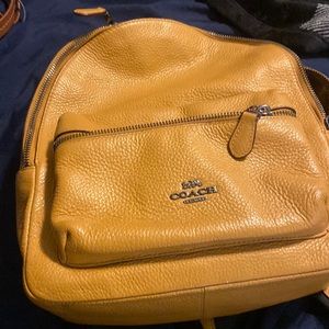 Coach backpack good condition token care of just has makeup on inside interior